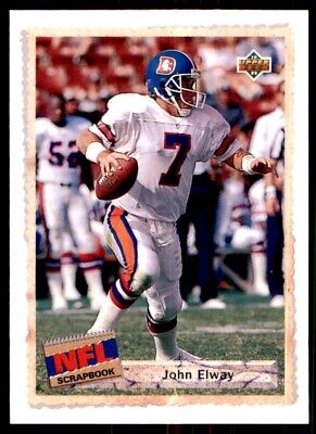 John Elway in white uniform dropping back to pass - Upper Deck 1992 #514 card image