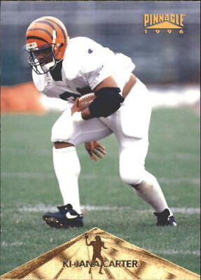 Cincinnati Bengals player Ki-Jana Carter in white uniform running with football