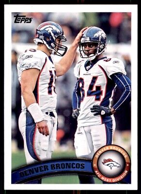 Topps football card of Denver Broncos players in white uniforms on the field