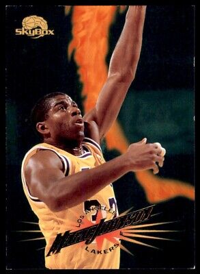 Basketball player in yellow Lakers jersey soaring in 1995-96 SkyBox Premium Magic Johnson card