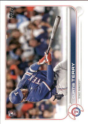 Curtis Terry Rookie Texas Rangers batter swinging in blue uniform on baseball card