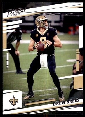 Drew Brees in black uniform throwing football for Panini Prestige New Orleans Saints #215