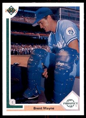 Brent Mayne in Kansas City Royals uniform crouching in dugout for Upper Deck card