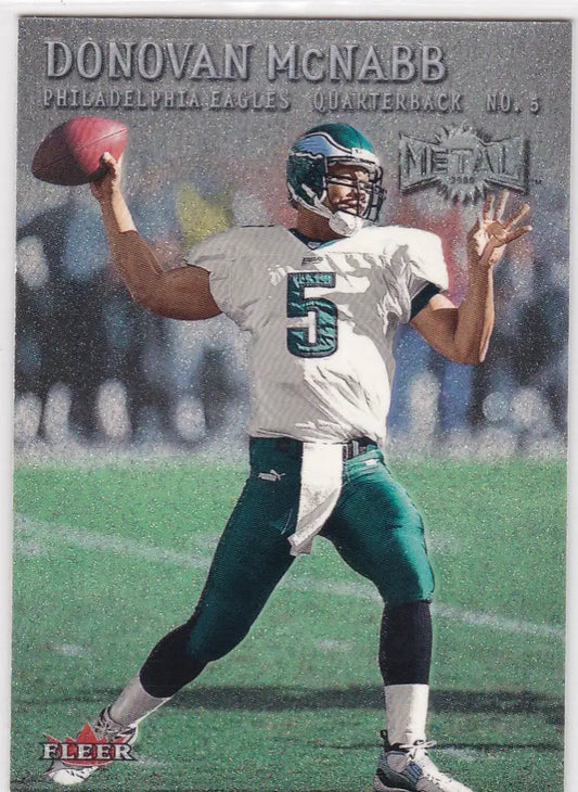 Donovan McNabb in a white Philadelphia Eagles jersey #5 ready to throw a pass