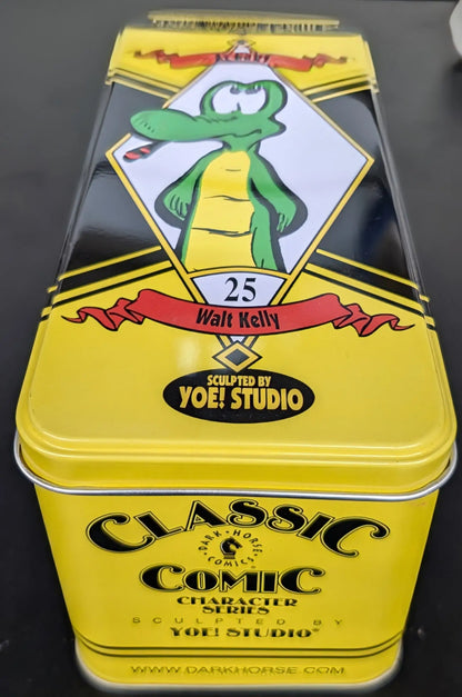 Yellow vintage-style tin box featuring a cartoon alligator and Classic text design