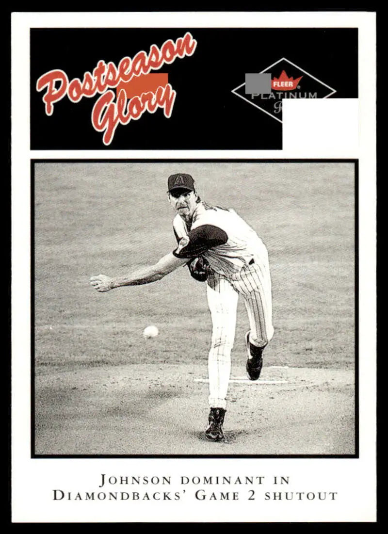 Black and white baseball card of Randy Johnson in delivery for Arizona Diamondbacks Fleer Platinum