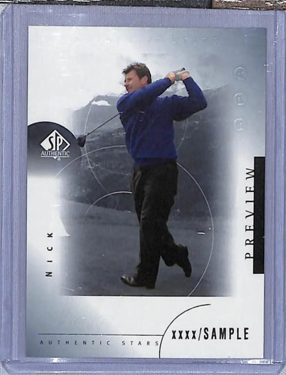 Trading card of Nick Faldo mid-swing in navy blue sweater, Upper Deck SP Authentic