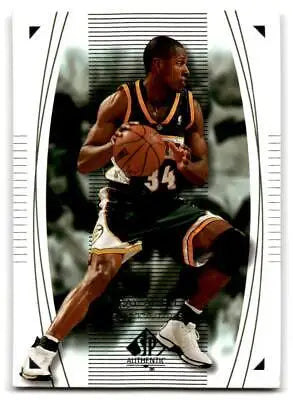 Ray Allen holding a basketball from the 2003-04 SP Authentic trading card set