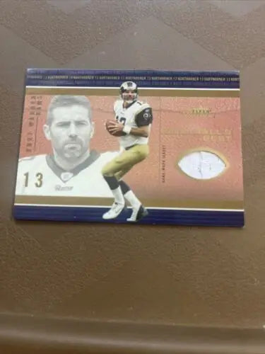 Kurt Warner trading card from Fleer Showcase showcasing St. Louis Rams jersey design