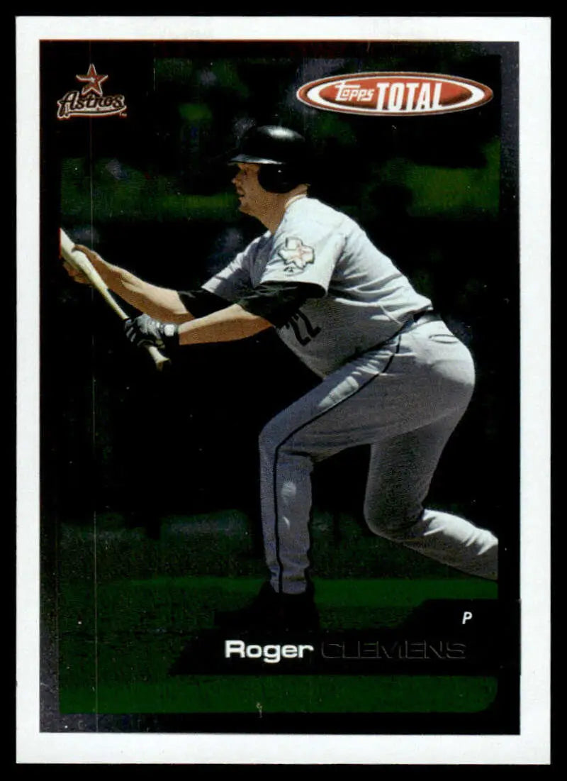 Baseball player Roger Clemens in Houston Astros uniform prepares to bunt for Topps Total