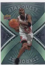 Basketball player in white uniform dribbling ball from Michael Jordan Starquest Chicago Bulls