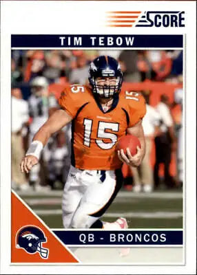 Tim Tebow running with the ball in an orange Denver Broncos jersey trading card