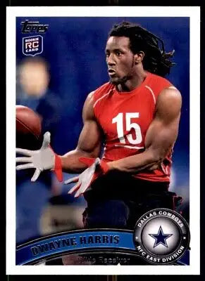 Dwayne Harris rookie card from 2011 Topps Dallas Cowboys #386 on display