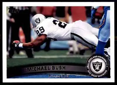 Football player diving for ball in 2011 Topps Michael Bush Oakland Raiders #147 card