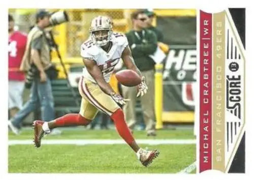 Michael Crabtree catching football in original gloss 2013 Panini Score card