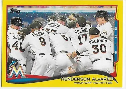 Baseball card of Henderson Alvarez celebrating with Marlins in original gloss Topps Yellow