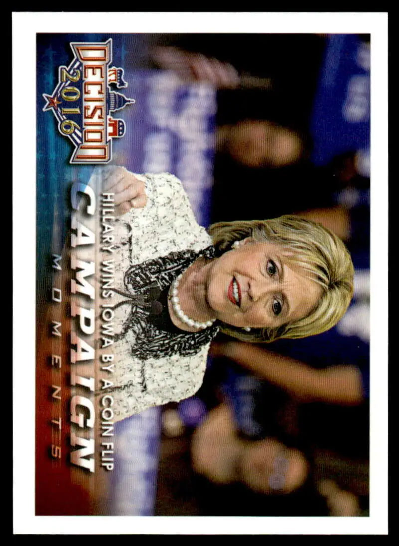 Trading card of Hillary wins Iowa by a coin flip in a sparkly silver outfit