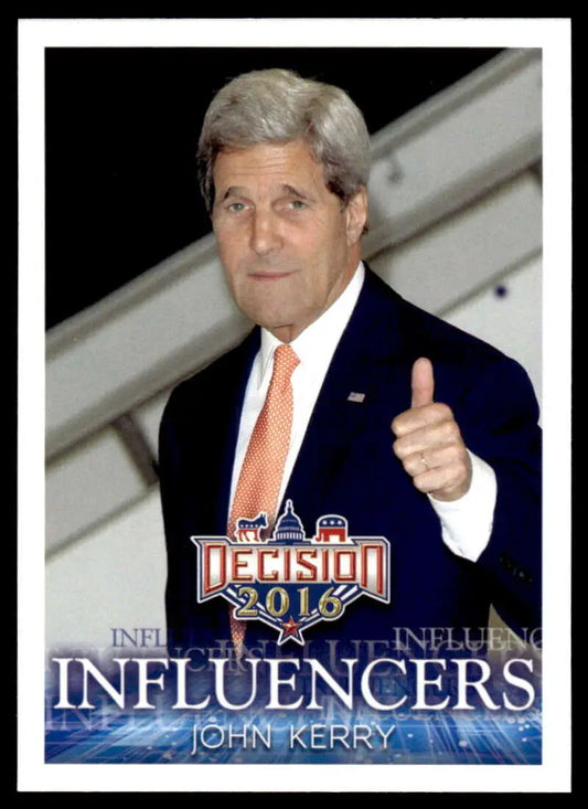 Person in navy suit and orange tie giving thumbs up on 2016 John Kerry trading card