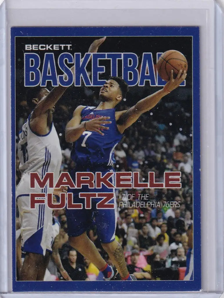 Basketball trading card of Beckett Markelle Fultz in blue jersey making a layup