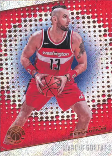 Marcin Gortat in red Washington Wizards jersey holding basketball, 2017-18 Panini Revolution Card