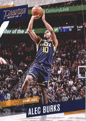 Alec Burks shooting a basketball for the Utah Jazz on a 2017-18 Prestige card