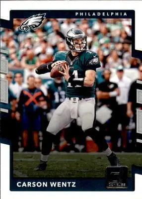 Carson Wentz of the Philadelphia Eagles throwing a football on 2017 Donruss card