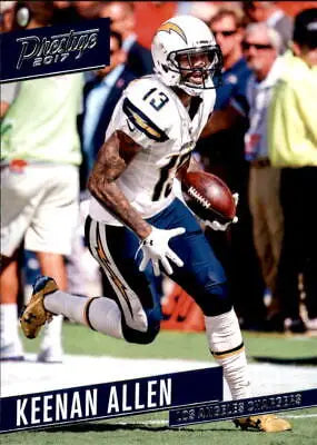 Keenan Allen of the Los Angeles Chargers running with the football card collectible