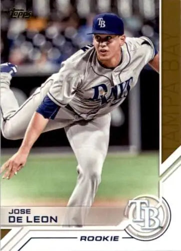 Baseball card of Jose De Leon in mid-delivery wearing gray road uniform Topps Salute