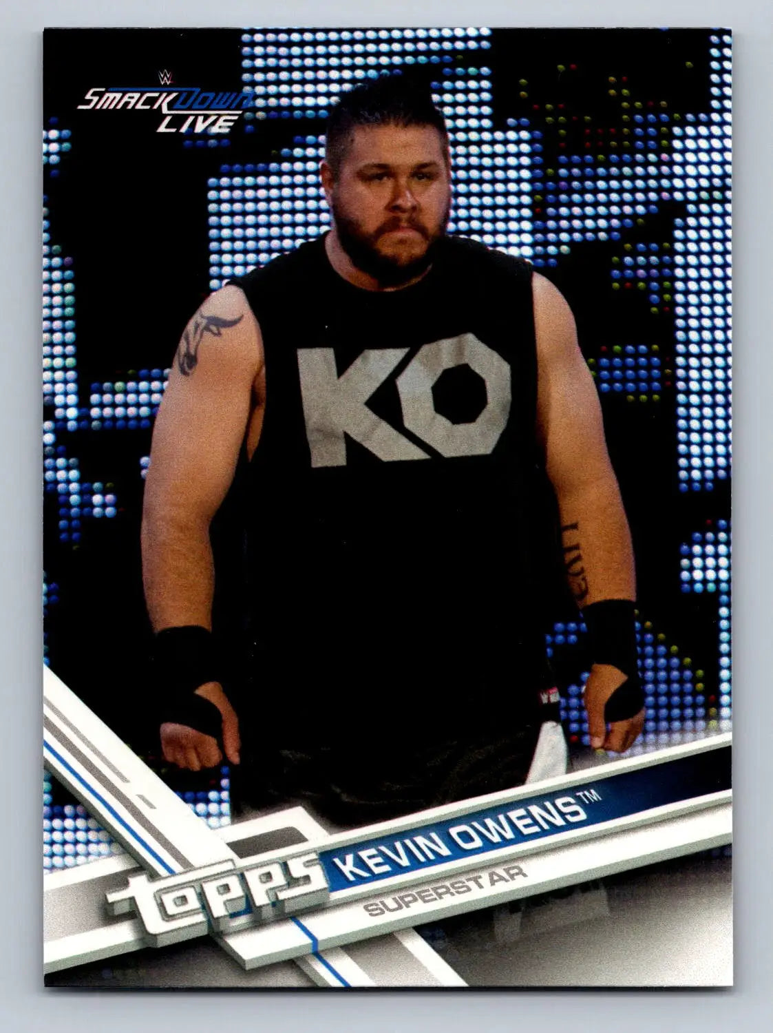 2017 Topps WWE #151 Kevin Owens wrestling card showcasing his intense action pose