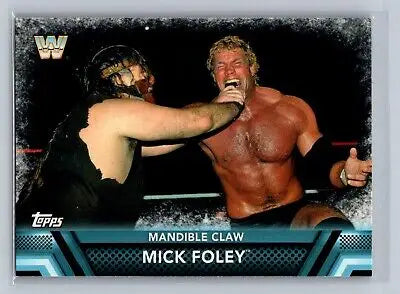 Mick Foley wrestling card from 2017 Topps WWE #F-21 featuring Mandible Claw move