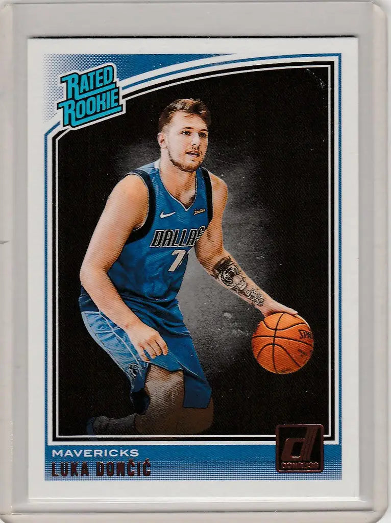 Basketball trading card of Luka Doncic dribbling for Dallas Mavericks, Donruss Rated Rookie