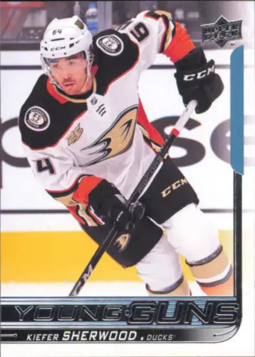 Hockey player in Anaheim Ducks jersey skating, featuring Kiefer Sherwood 2018-19 Upper Deck card