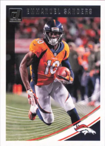 Emmanuel Sanders Denver Broncos player in orange jersey carrying football during game