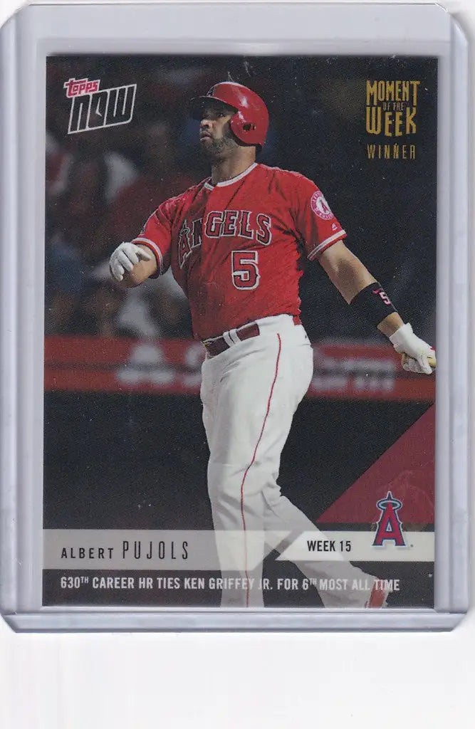 Baseball card of Albert Pujols Angels in red uniform, MOW-15W Week Winner Gold