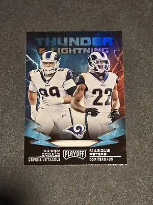 Football trading card featuring Aaron Donald and Marcus Peters from Panini Playoff