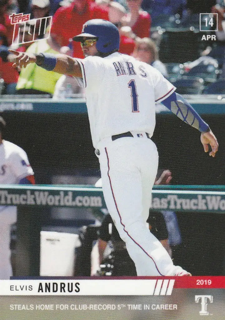 Baseball player in white uniform swings bat for Elvis Andrus steals home moment