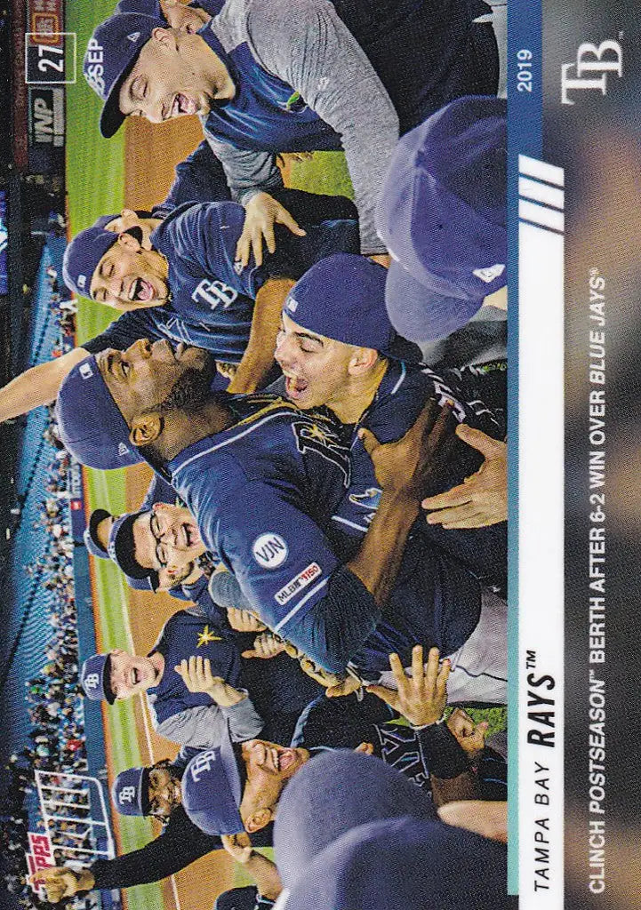 Group of Tampa Bay Rays celebrating in huddle after clinching postseason berth