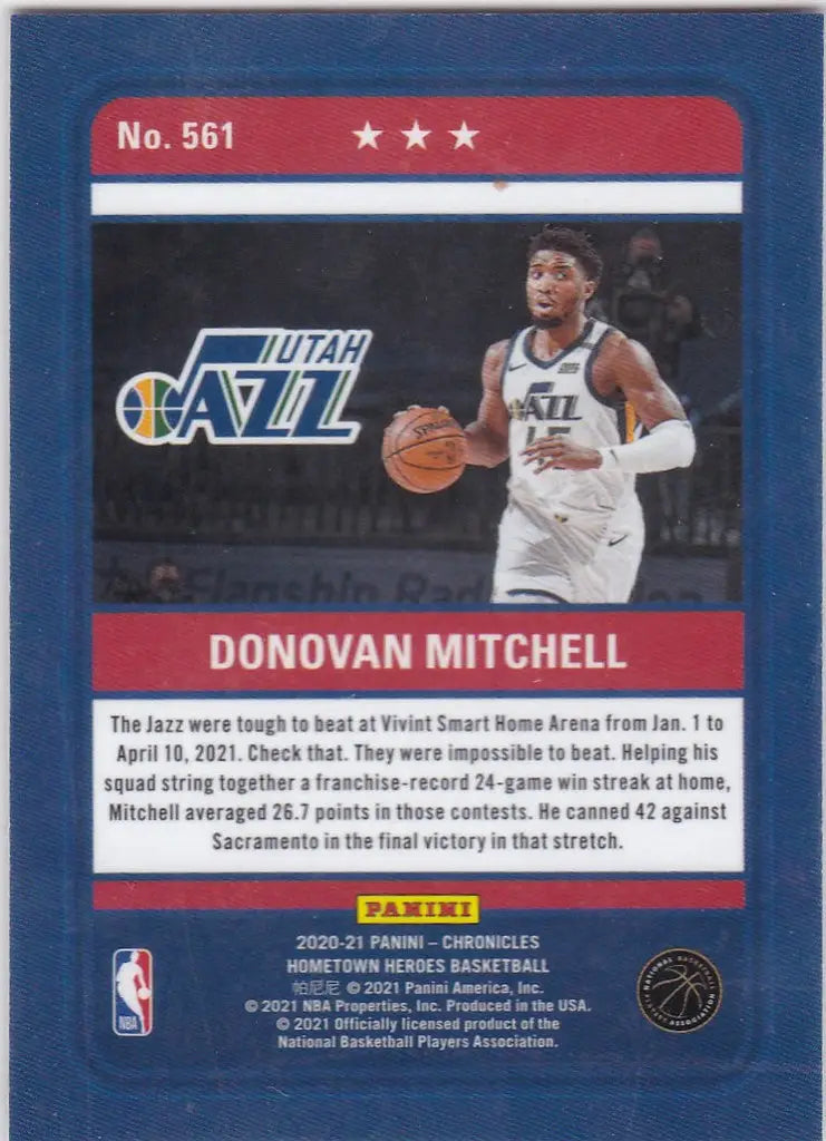 Basketball trading card of Donovan Mitchell Utah Jazz holding a ball in 2020-21 Chronicles