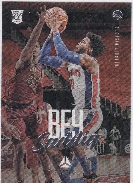 Basketball trading card of Saddiq Bey competing for ball in 2020-21 Chronicles Luminance