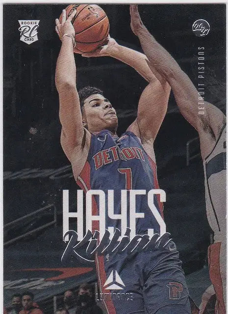 Basketball player in a Detroit Pistons jersey shooting ball for Killian Hayes RC Detroit