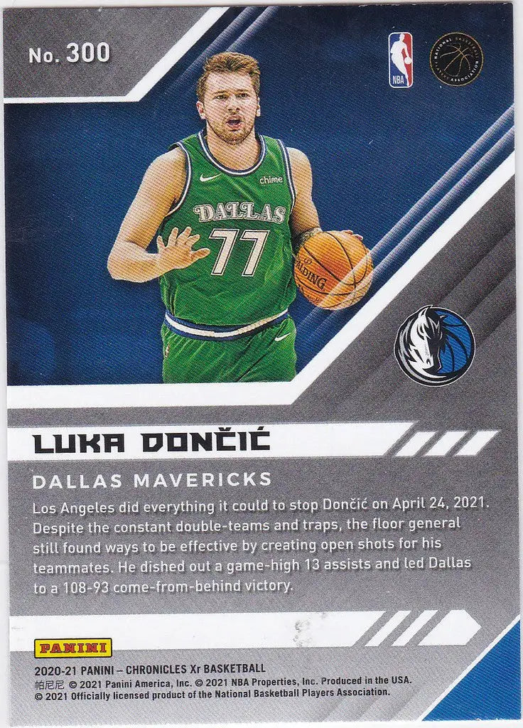 Basketball trading card of Luka Doncic Dallas Mavericks in green jersey holding basketball