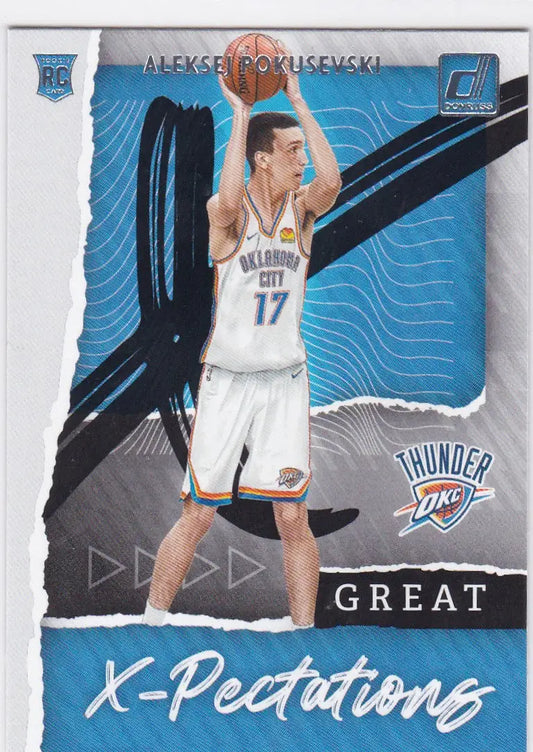 Basketball trading card of Aleksej Pokusevski from Oklahoma City Thunder holding ball