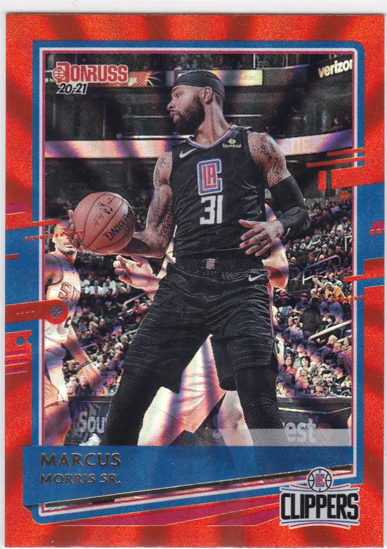 Basketball trading card of Marcus Morris Sr in black uniform with number 31 Orange Laser