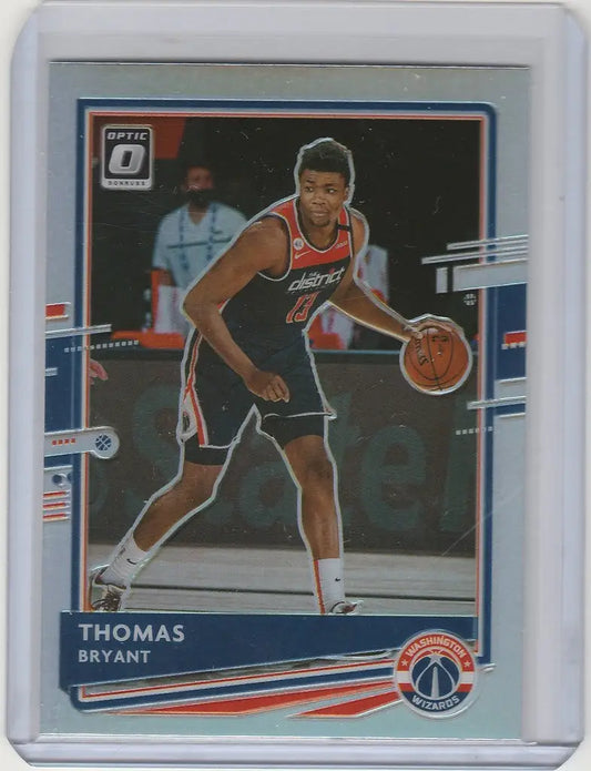 Basketball trading card of Thomas Bryant Washington dribbling for Panini Donruss Optic