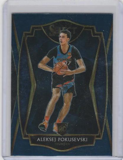 Aleksej Pokusevski Thunder on 2020-21 Panini Select Blue trading card holding basketball