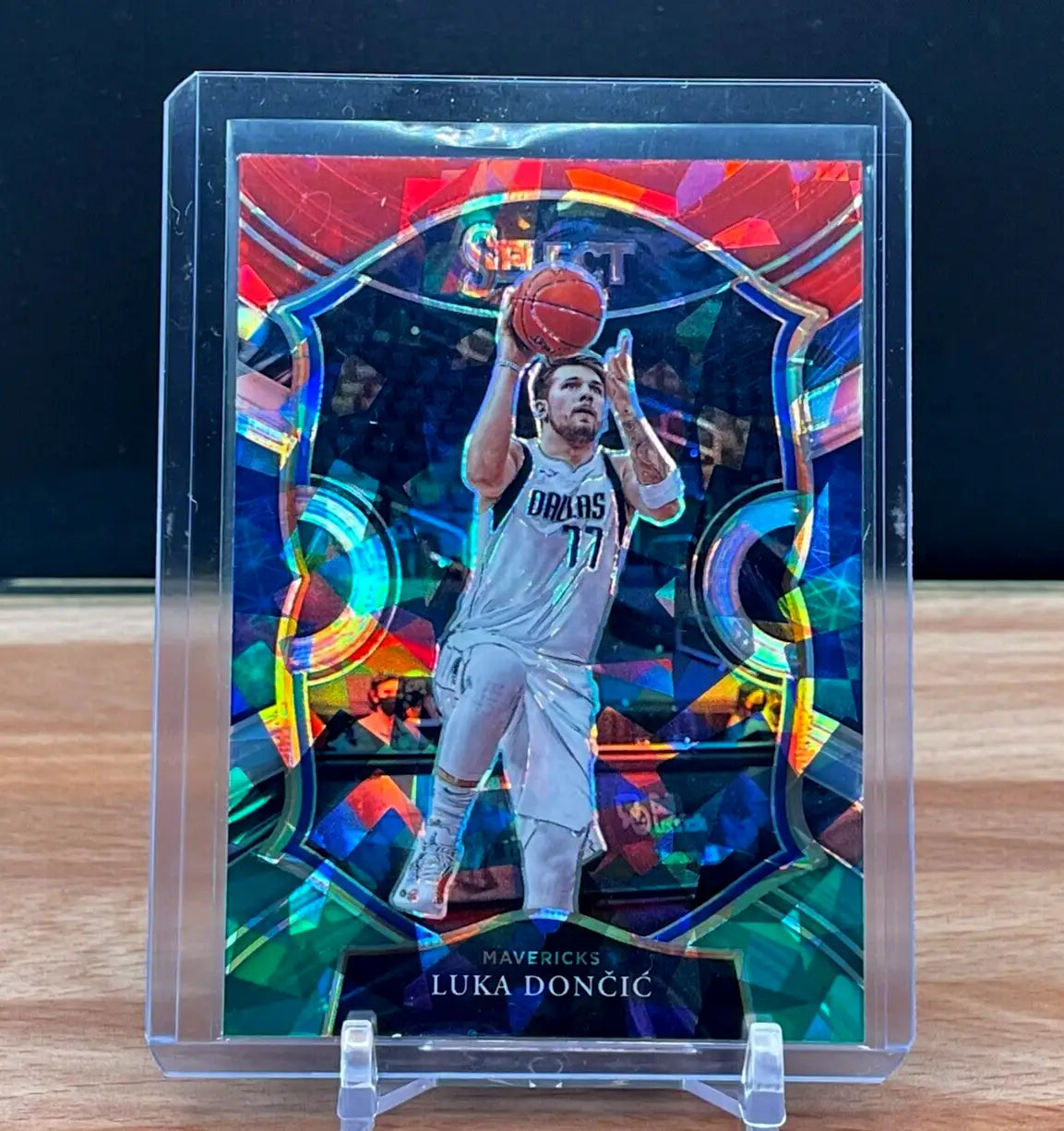 Luka Dončić basketball card showcasing 2020-21 Panini Select green cracked ice design