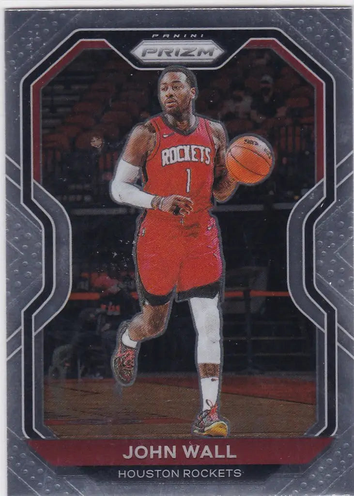 Basketball trading card of John Wall Update Houston in red uniform dribbling ball