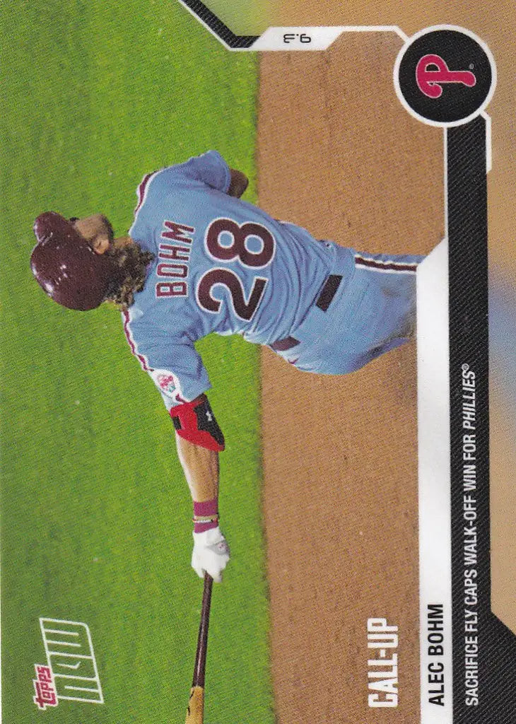 Alec Bohm pitching in a light blue uniform for the Philadelphia Phillies on the field