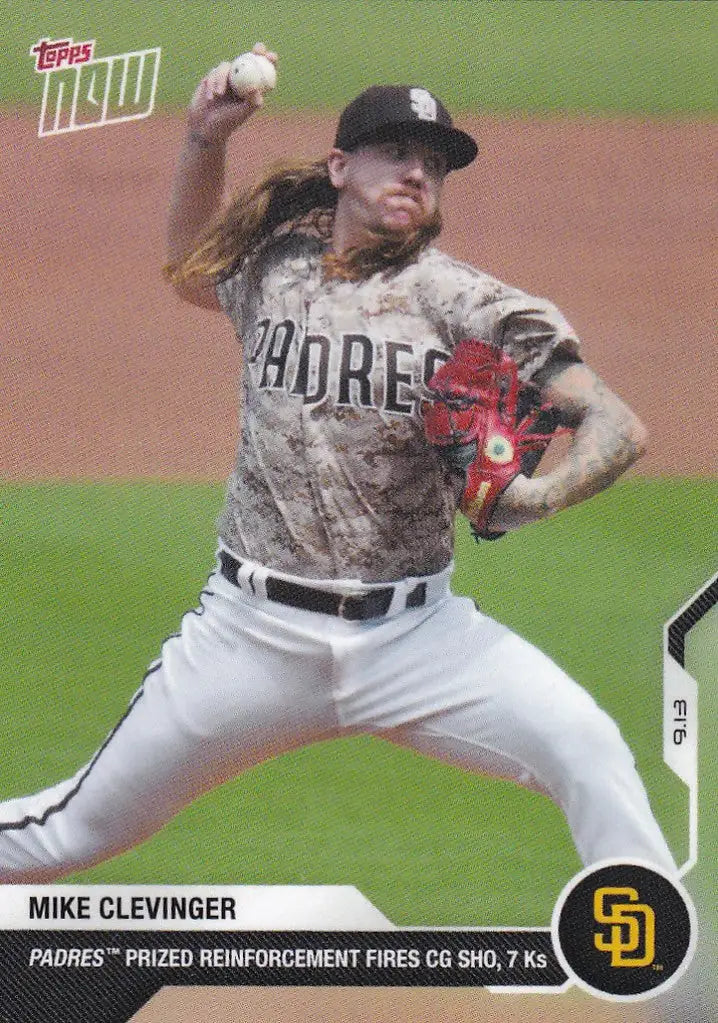 Baseball pitcher Mike Clevinger in mid-throw wearing San Diego Padres uniform