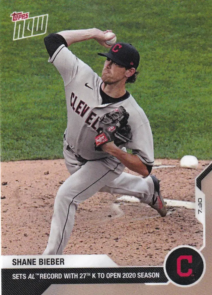 Baseball pitcher Shane Bieber in mid-throw wearing a Cleveland Indians uniform